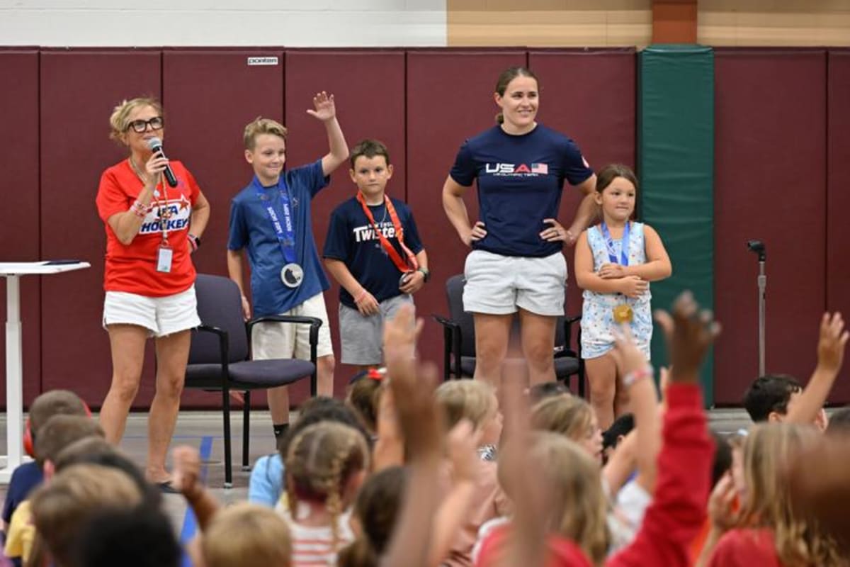 Olympic Gold Medalist Brings Medals to Beverly School - Image 4