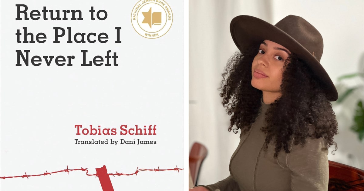Dani James holding a copy of Return to the Place I Never Left memoir