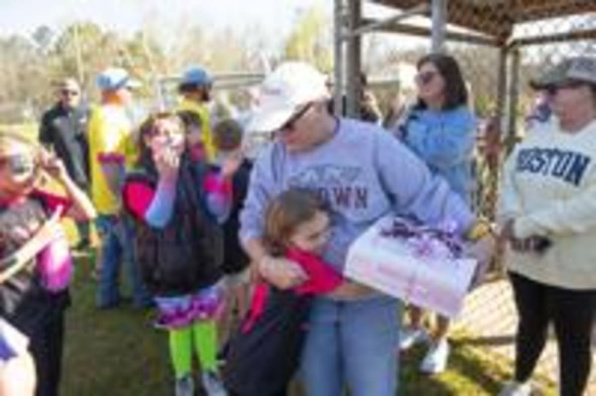 PE Teacher Battling Cancer Throws First Pitch in Alabama - Image 4