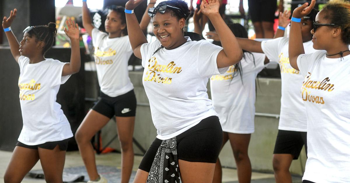 ** Teenage dancer Myhkasia Lucas performs with youth dance team at Johnstown Juneteenth celebration