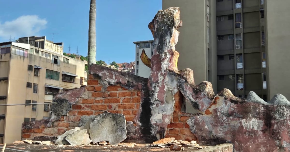 Woman speaking on video call showing earthquake damage to home in Venezuela