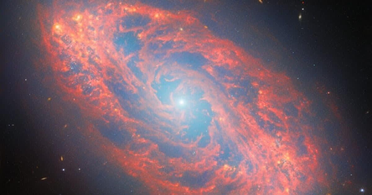 Spiral galaxy NGC 5134 captured by James Webb Space Telescope showing tightly wound arms and stellar clusters