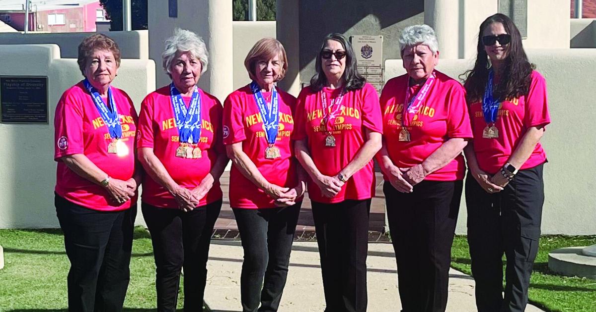 Six smiling senior women from Las Vegas, New Mexico display their gold, silver, and bronze medals