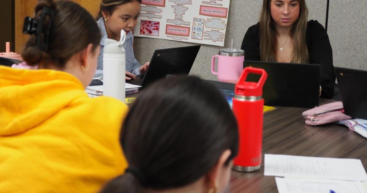 ** Northwest Career and Technical Center students working on Licensed Nursing Assistant applications in classroom setting