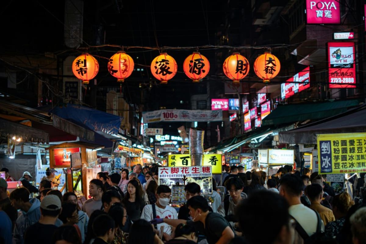 Taiwanese city skyline with modern buildings symbolizing economic progress and social change