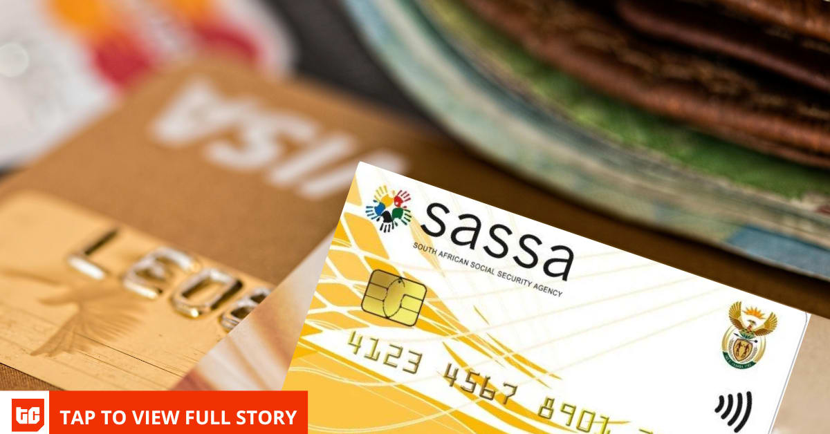 South African social security beneficiaries receiving increased monthly grant payments at local office