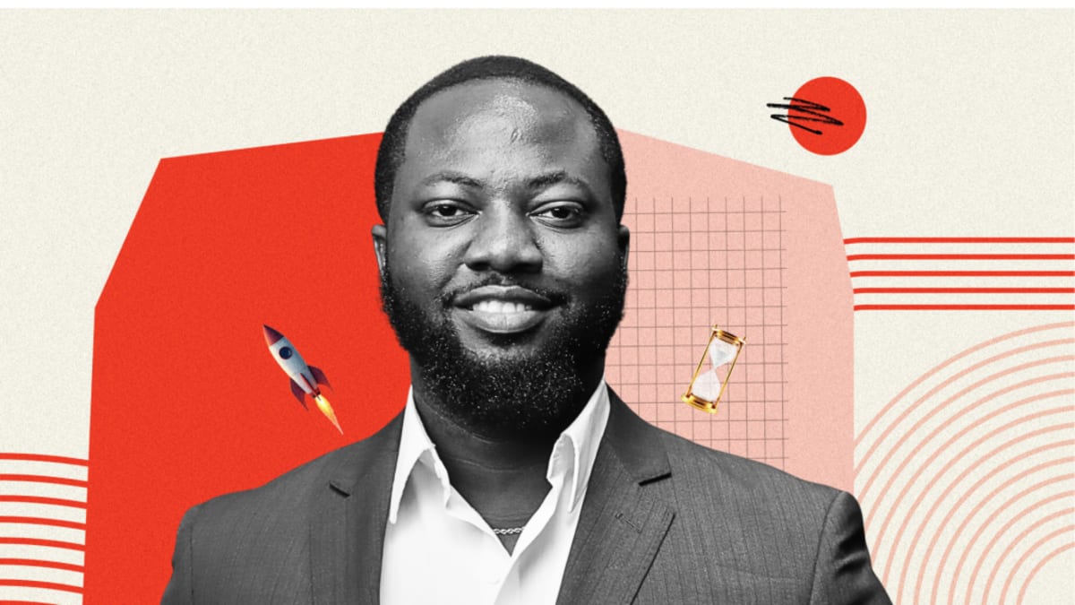 Young Nigerian entrepreneur Temidayo Oniosun working on laptop building space intelligence company