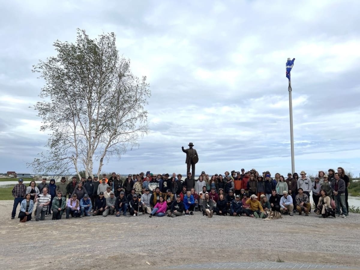 Community members celebrating at reforestation project ceremony in Behchokǫ̀, Northwest Territories