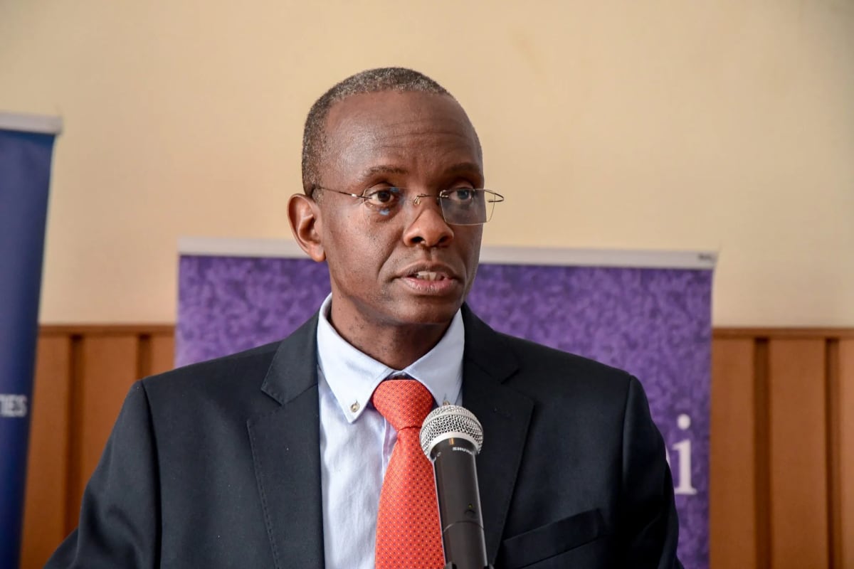 Kenyan and Japanese researchers collaborating in a modern science laboratory setting