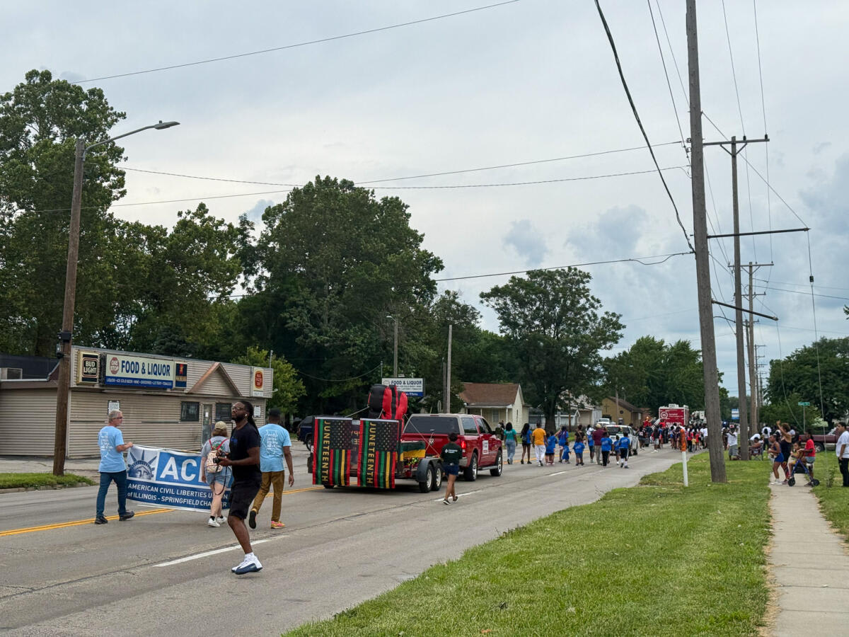 Families line Martin Luther King Jr. Drive watching Springfield's annual Juneteenth Unity Parade celebration