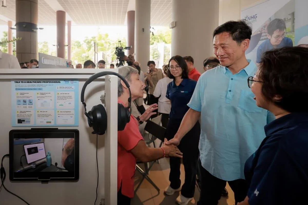 Health Minister Ong Ye Kung tours technology exhibition showcasing AI health tools at Woodlands Hospital Singapore