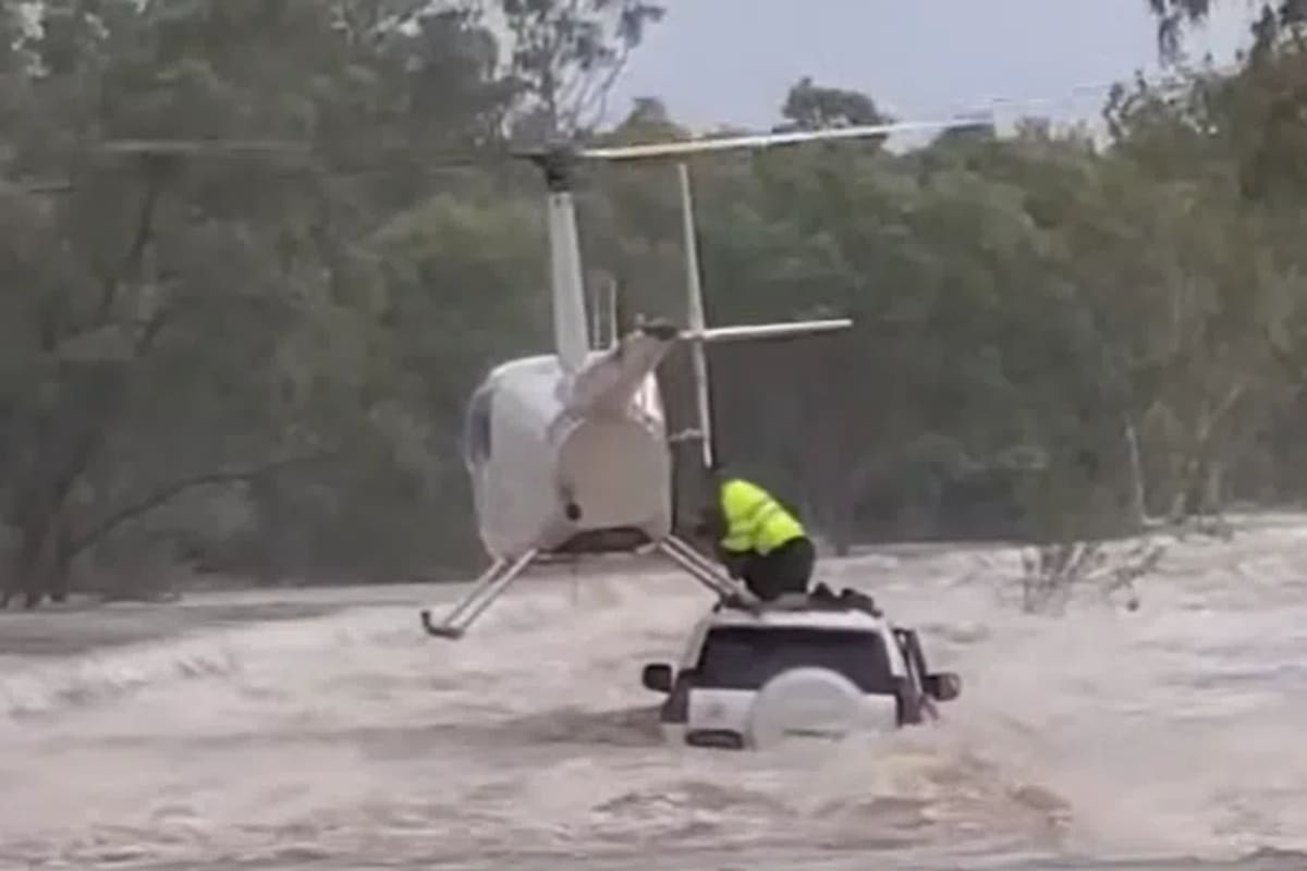 Pilot Rescues Two Men and Dog From Flood in Australia