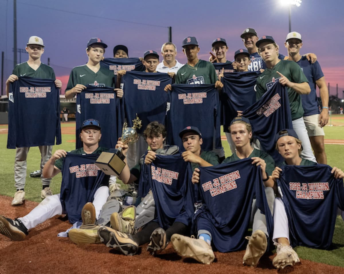 South Boston A's youth baseball team poses together after winning the RBI League championship
