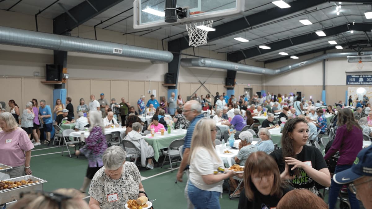 Large group of cancer survivors and families celebrating together at community event in Colonie, New York