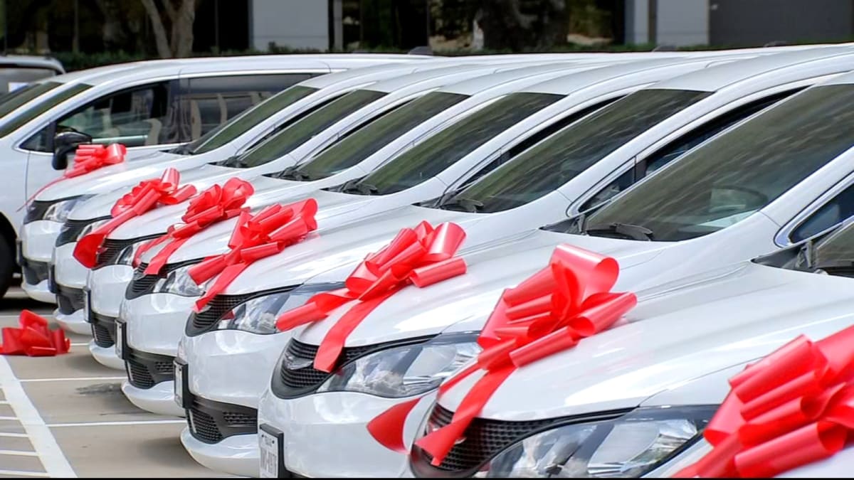 Houston Charity Gifts Record 98 Vans to Families in Need