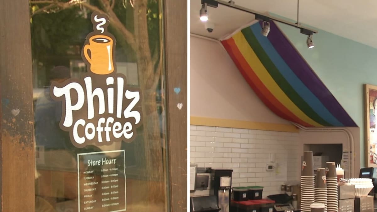 Pride flags displayed outside Philz Coffee storefront in San Francisco's Mission District