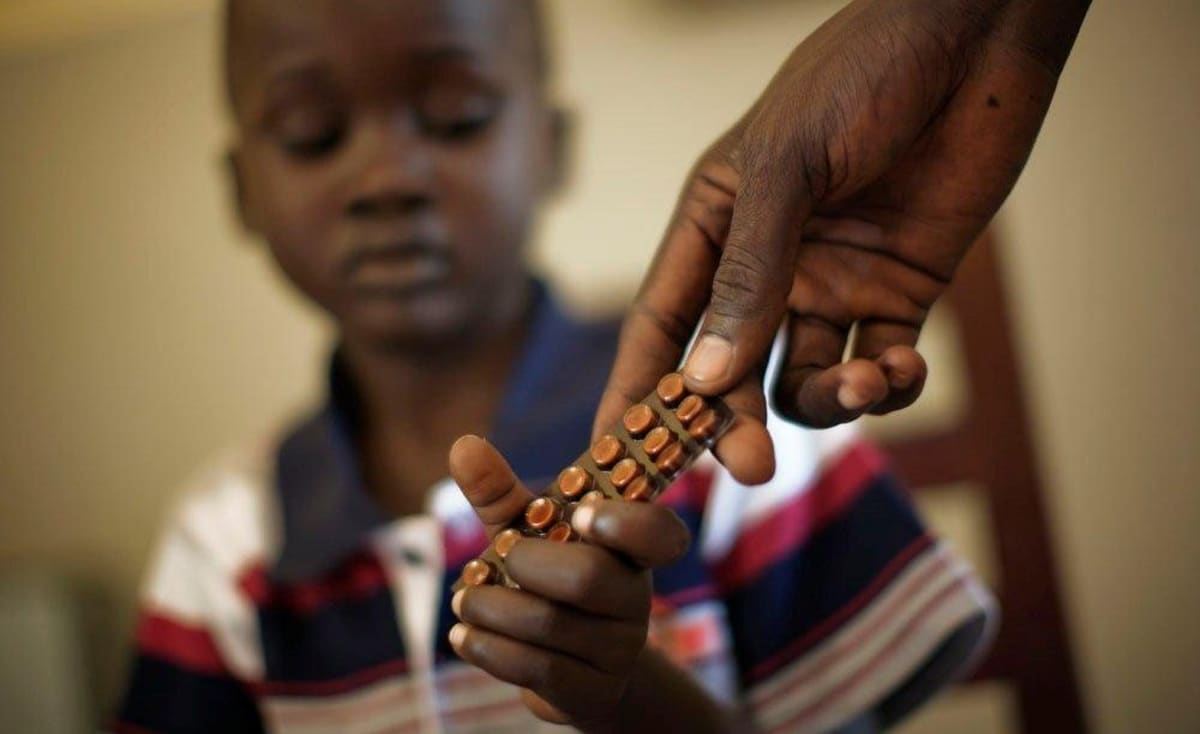 Health workers in Sudan preparing medical supplies for national disease prevention program