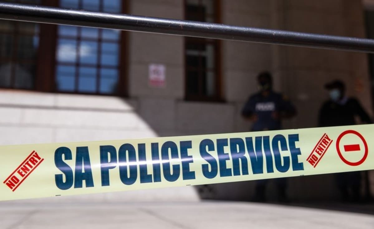 South African government buildings representing coordinated national effort against organized crime and corruption networks