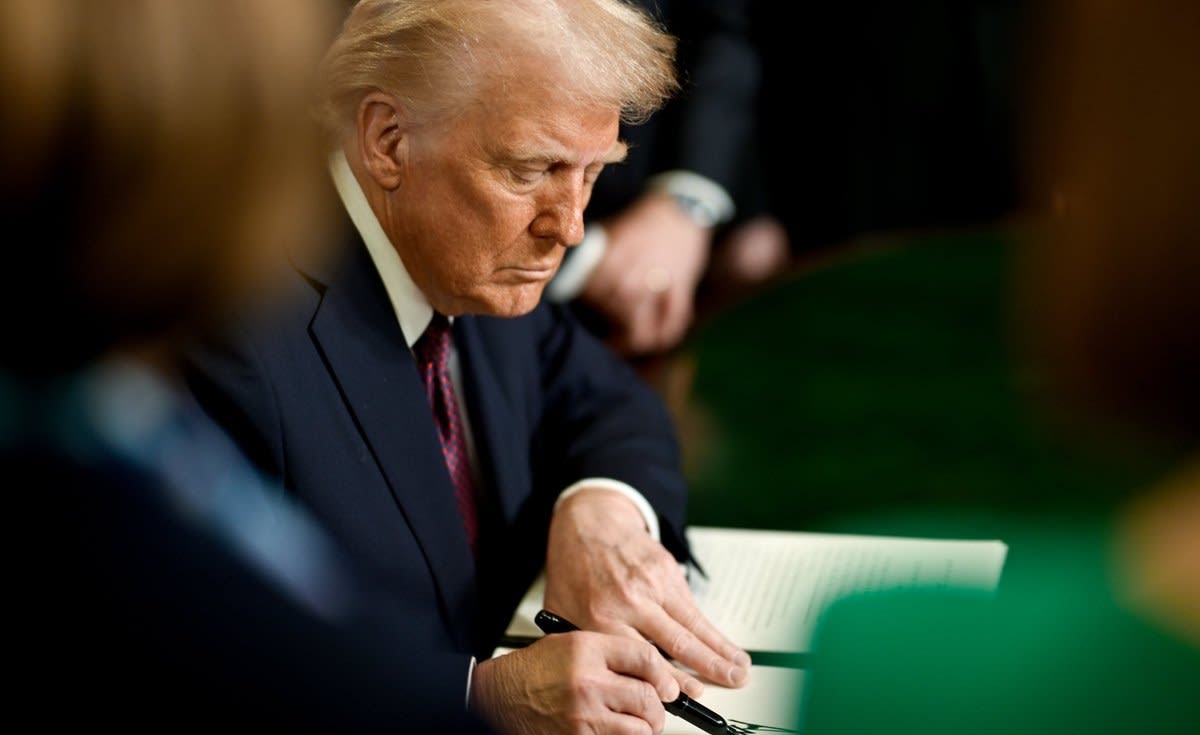 Somali American family smiling together representing communities protected by temporary deportation status ruling