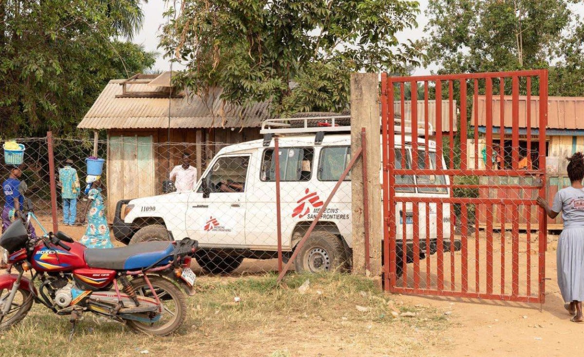 Healthcare workers providing medical care at a clinic in Ituri Province, Democratic Republic of Congo