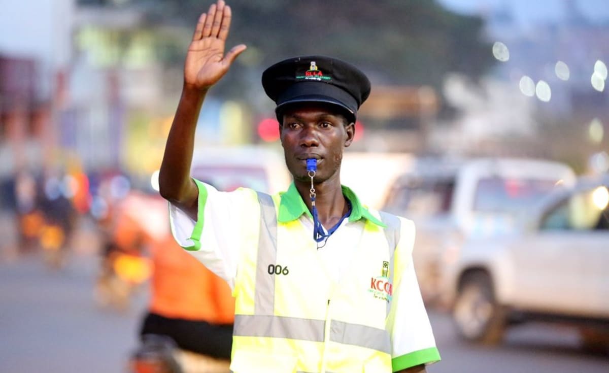 Passenger bus on Ugandan highway representing new driver safety regulations after crashes