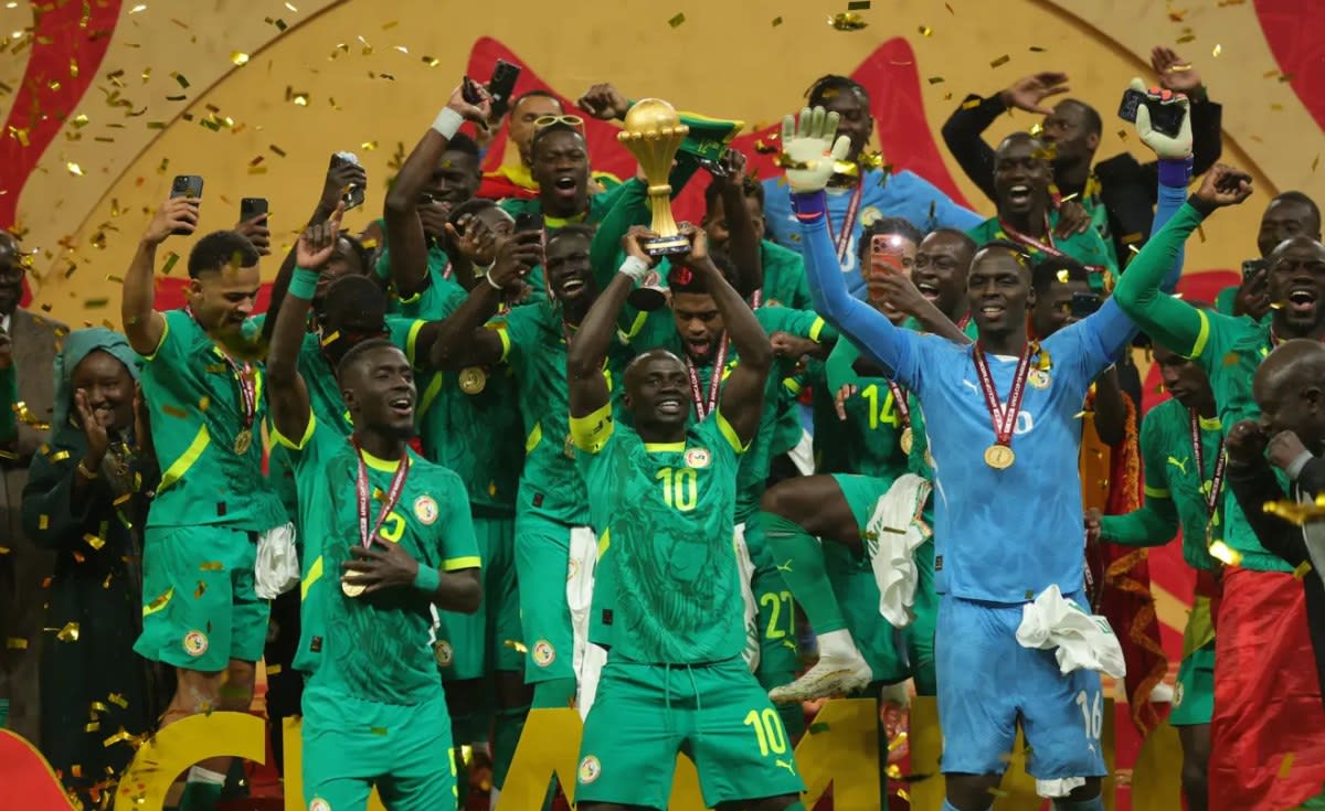 Senegalese soccer fans reuniting with families at Dakar airport after release from Morocco