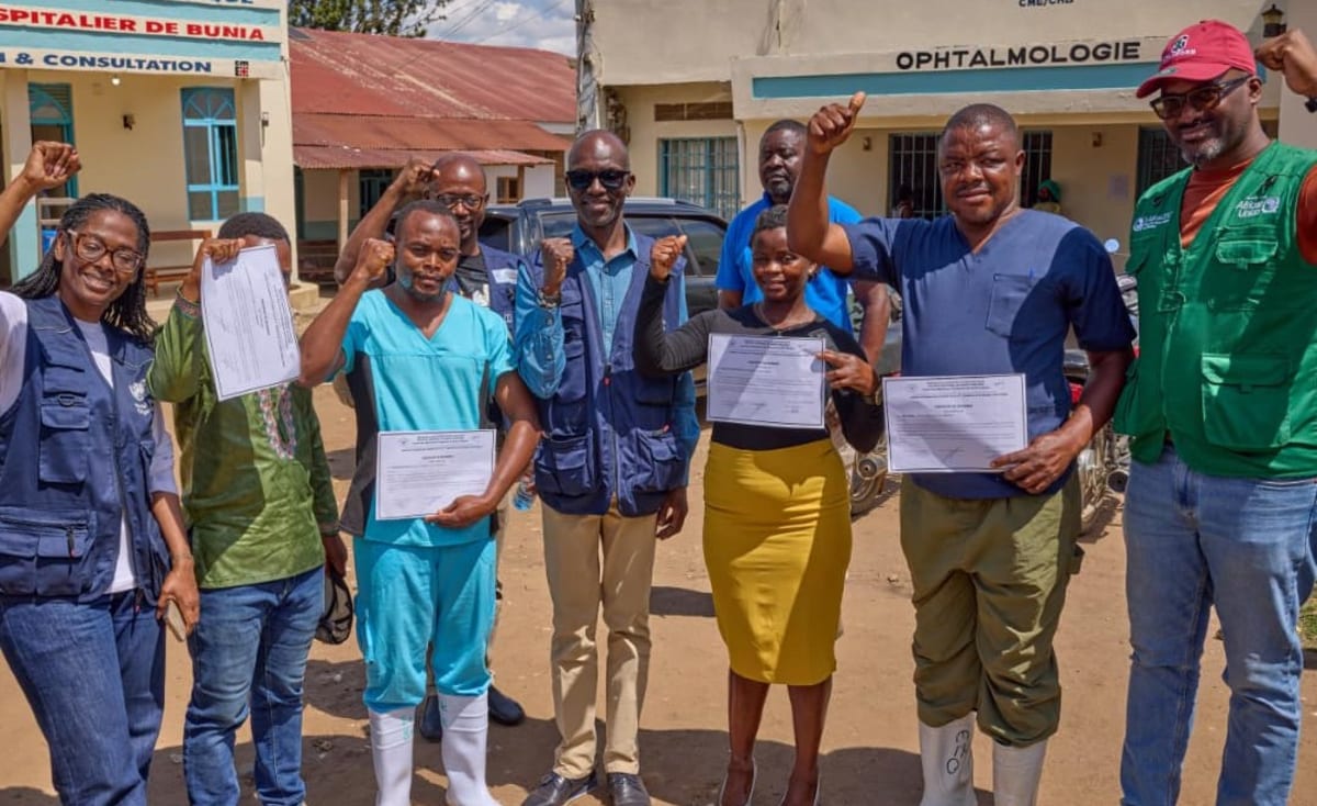 Healthcare workers in protective equipment at Ebola treatment facility in Democratic Republic of Congo