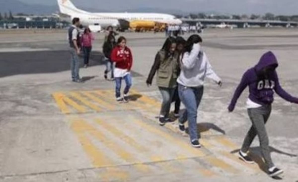 Airplane on tarmac at Roberts International Airport in Liberia welcoming new arrivals