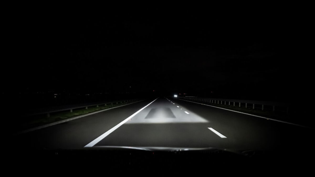 Close-up view of Audi's digital matrix LED headlight showing individual pixel elements illuminated