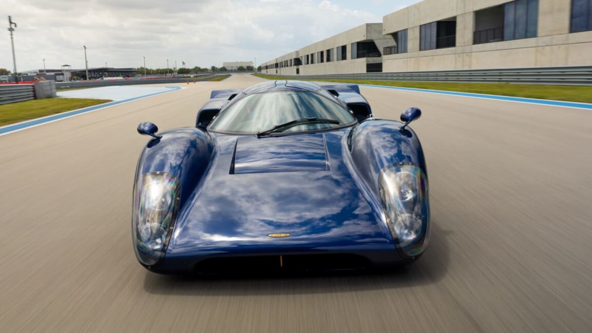 Blue Lola T70S vintage race car with sustainable plant based composite bodywork on track