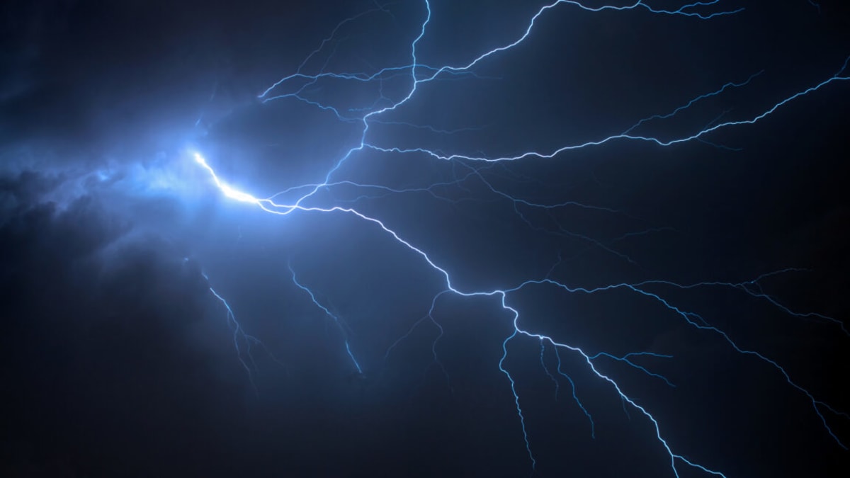 Lightning strike during thunderstorm with fiber optic cables underground detecting seismic waves from thunder