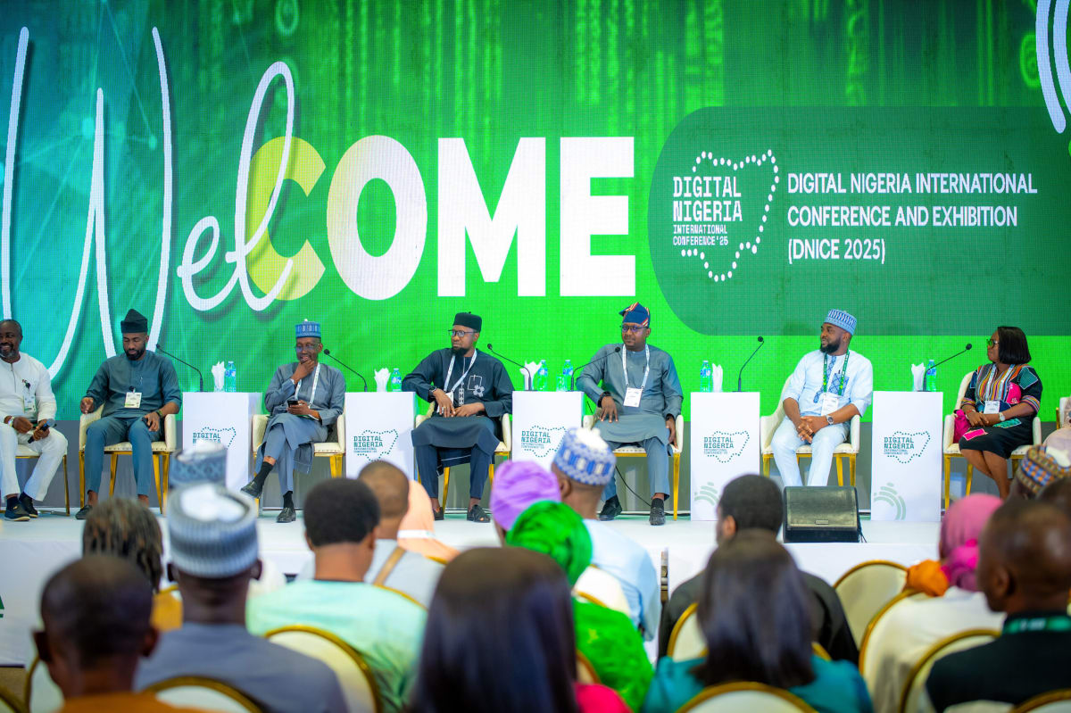 Nigerian tech entrepreneurs collaborating with corporate partners on digital solutions in modern office setting