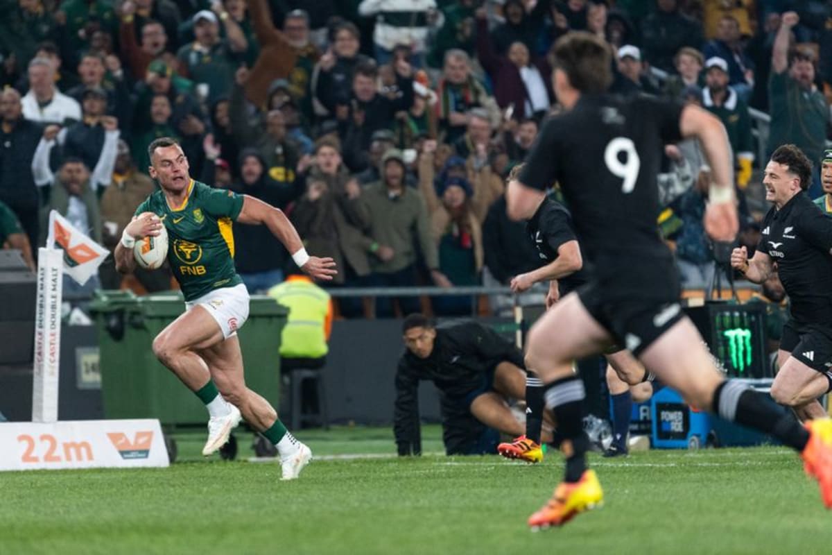 ** Springboks captain Siya Kolisi leads his team in victory celebration after historic win over All Blacks