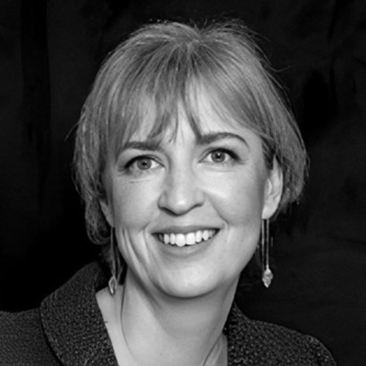 Performers in spotlight during Gabrielle Goliath's Elegy installation honoring victims of violence