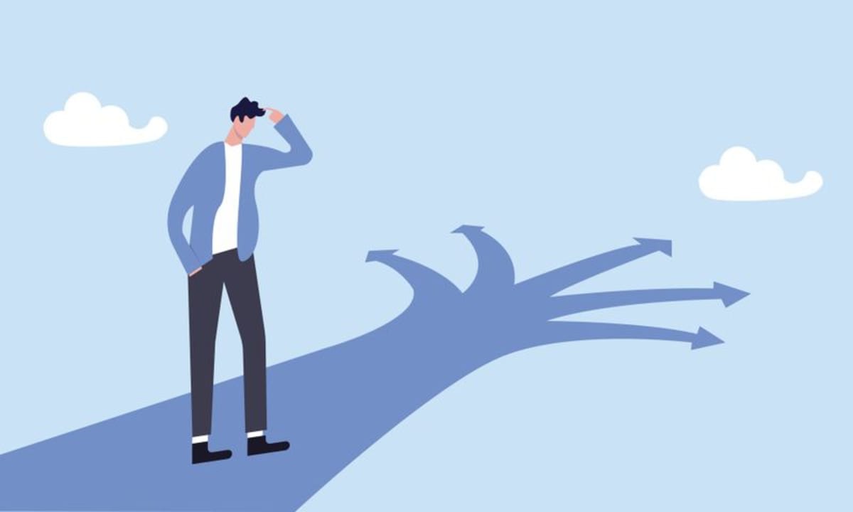 Person standing confidently at a crossroads with a compass, symbolizing value-guided decision making