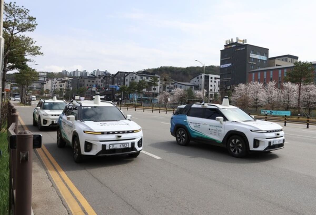 ** Self-driving electric vehicle at demonstration event for South Korean rental car industry leaders
