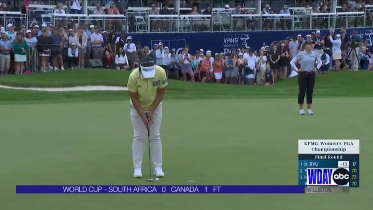** Professional golfer celebrating historic victory at KPMG Women's PGA Championship tournament