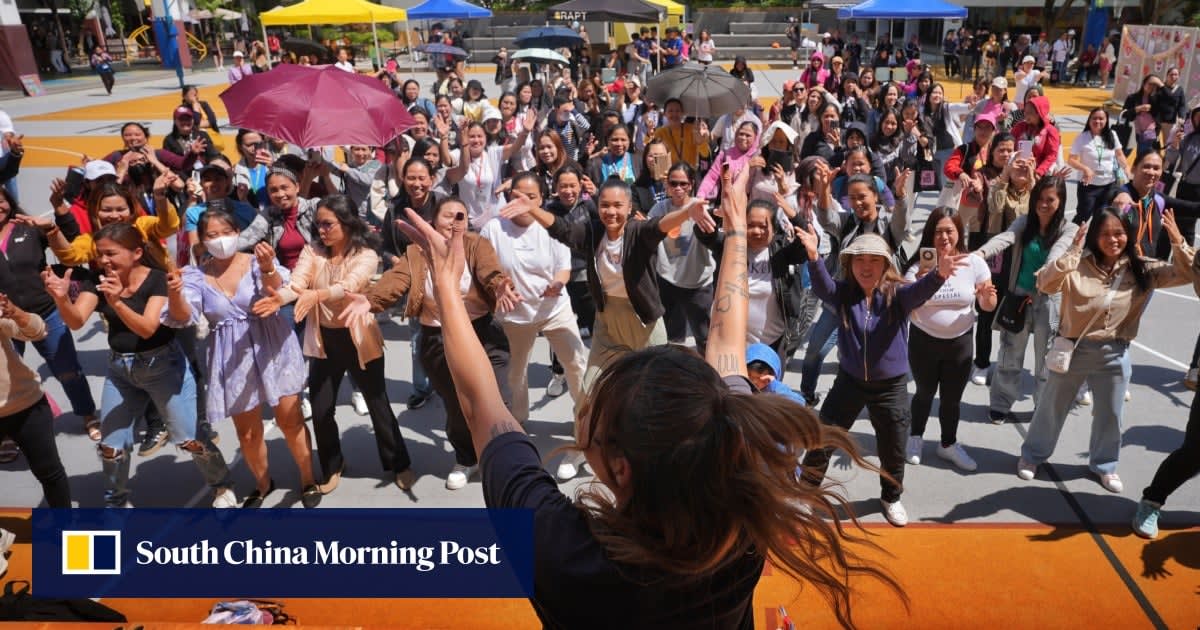 Foreign domestic helpers gathered at Hong Kong school campus celebrating annual appreciation day with students