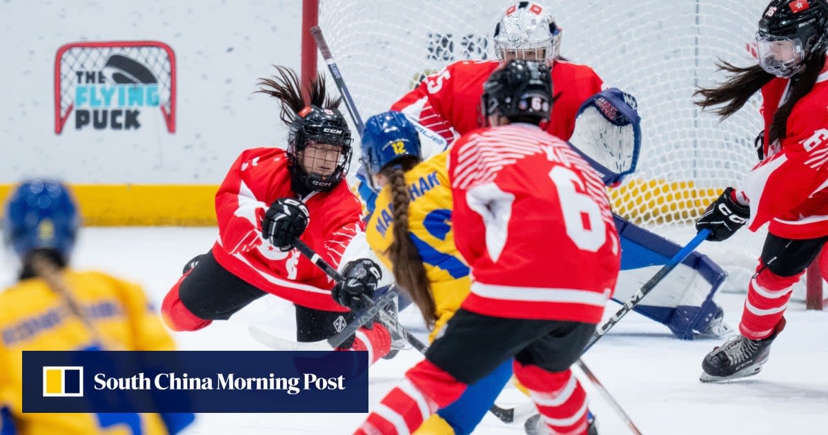 Hong Kong women's ice hockey players celebrating championship victory on home ice at Discovery Bay