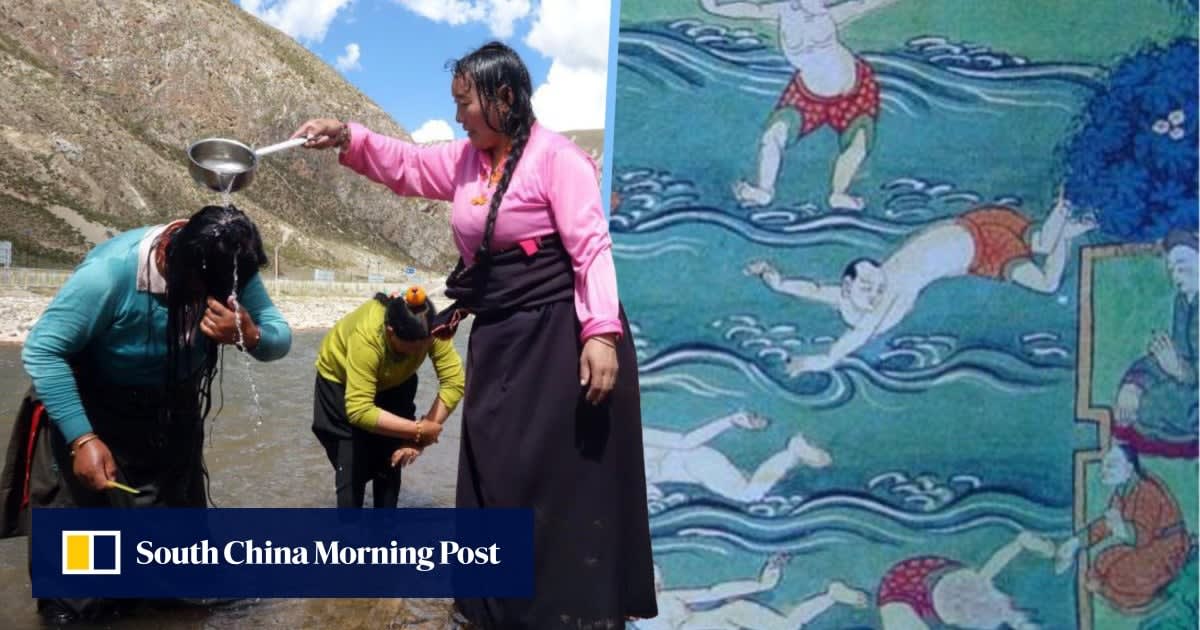 Group of Tibetan festival participants enjoying warm river water during traditional Bathing Festival celebration
