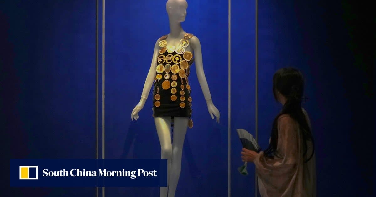 Ancient jewelry pieces displayed in modern museum cases at Hong Kong Palace Museum exhibition