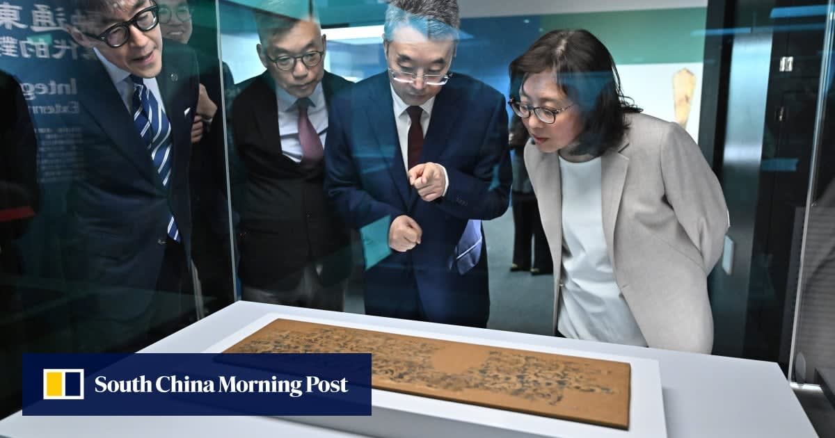Ancient Han dynasty artifacts displayed in glass cases at Hong Kong Heritage Discovery Centre exhibition