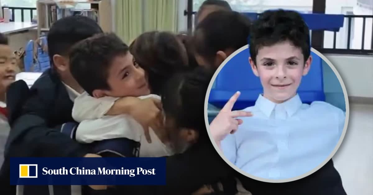 Iranian boy Radin hugging his best friend after returning to Chinese classroom