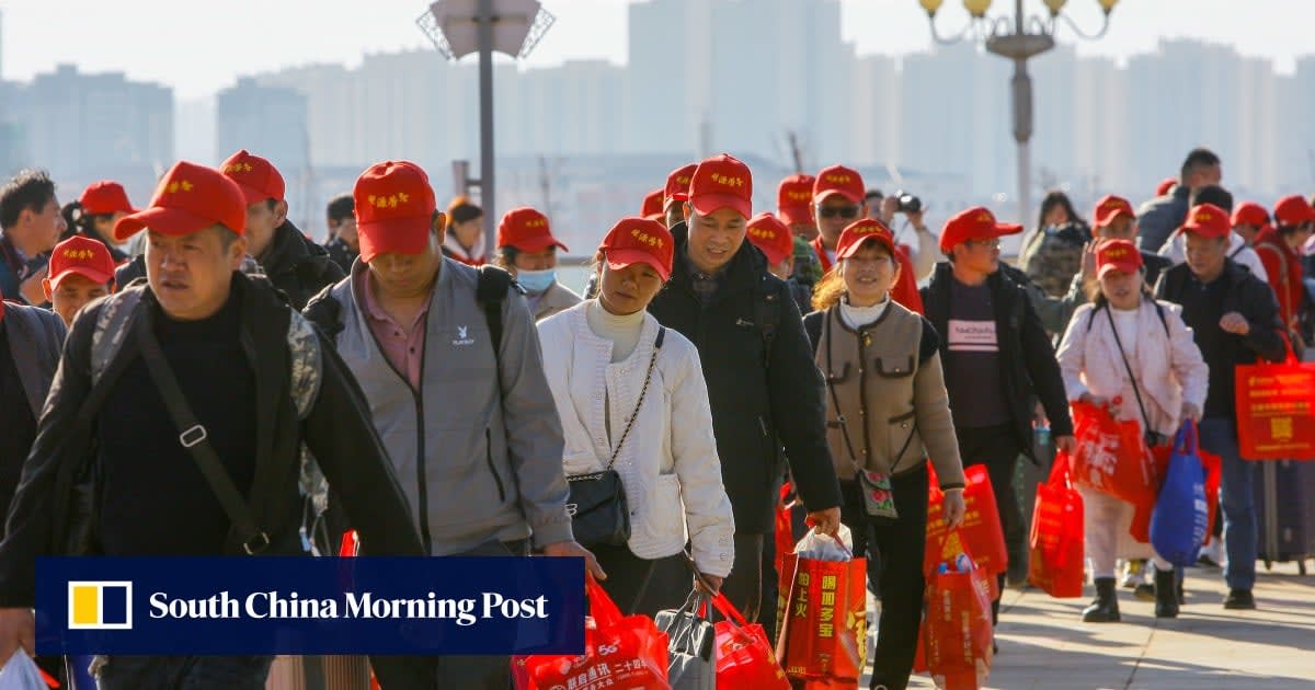 Diverse group of workers in urban Chinese city celebrating together with optimistic expressions