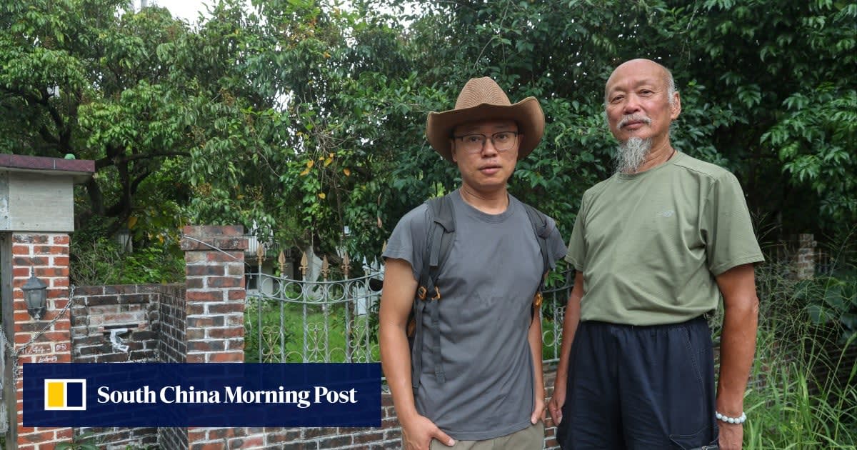 Ken Mak standing beside mature fruit trees planted by his grandfather in Hong Kong village