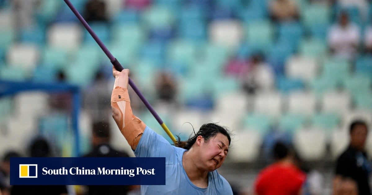 Young Chinese javelin thrower Yan Ziyi celebrating her record-breaking throw at Diamond League competition