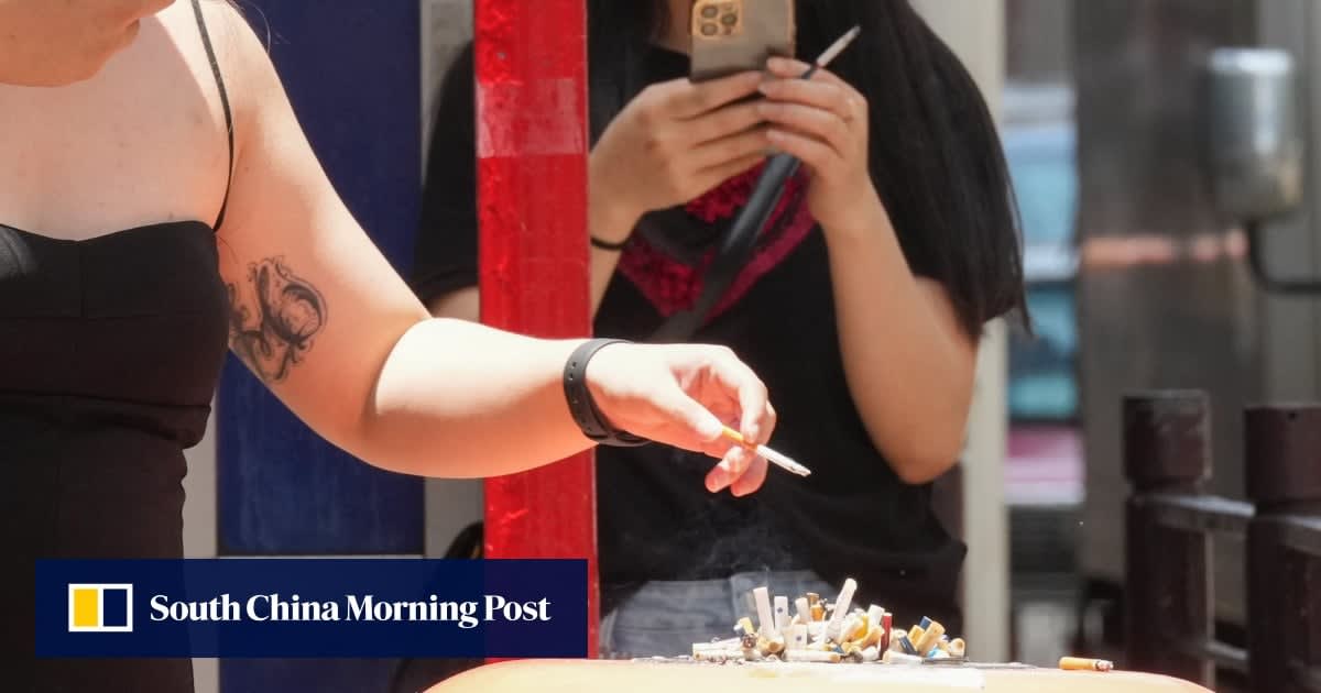 Person using smartphone to access AI health chatbot for smoking cessation support