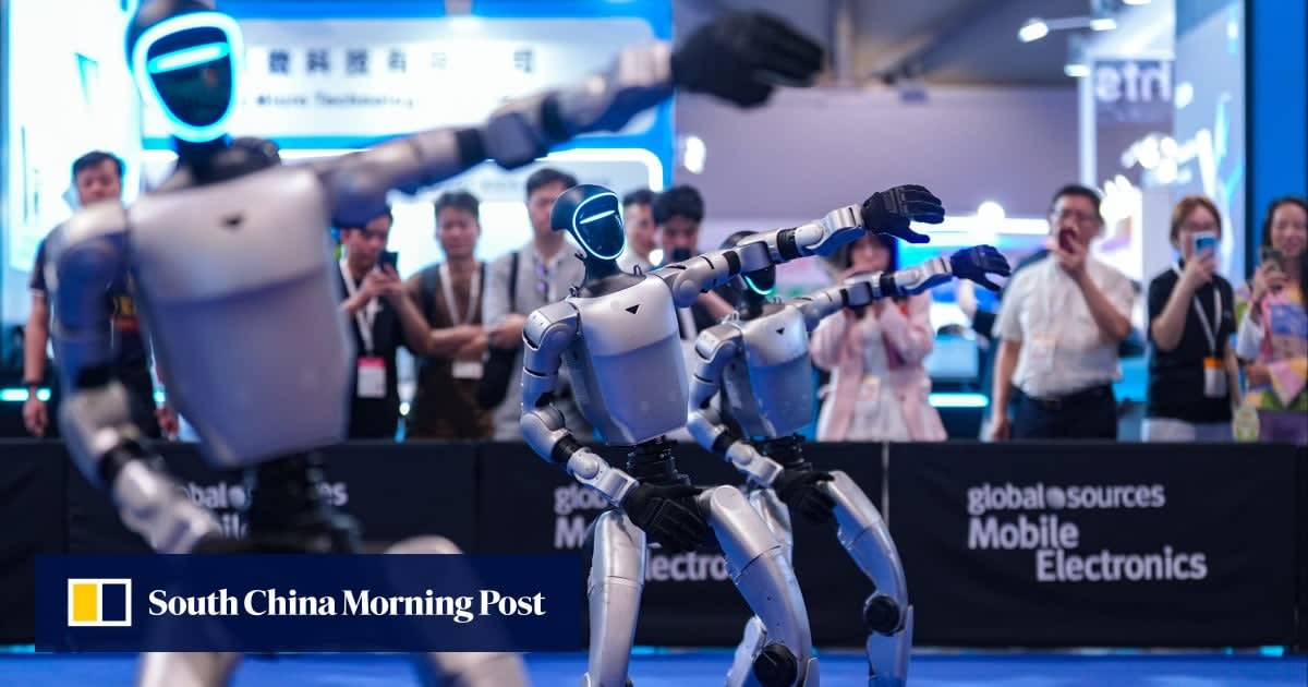 Human-sized H2+ humanoid robot with advanced five-fingered hands standing at technology expo
