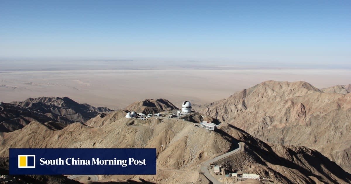 Telescope domes on Saishiteng Mountain summit in Qinghai province China under construction
