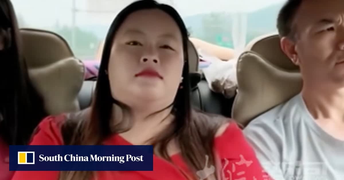 Liu Xiuhong embraced by her birth family members during their emotional reunion in China